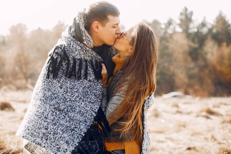 Beautiful couple spend time in a summer parkの写真素材
