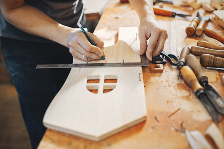 The carpenter works with a treeの写真素材