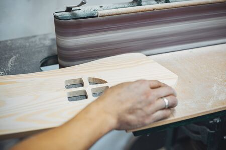 The carpenter works with a treeの写真素材