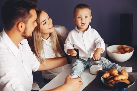 Family in a kitchenの写真素材