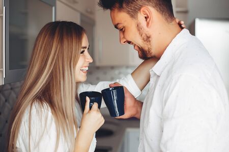 Beautiful couple at homeの写真素材