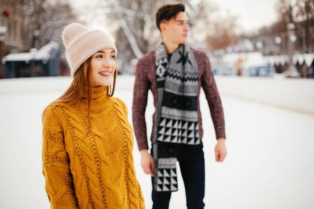 Cute couple in a winter cityの写真素材