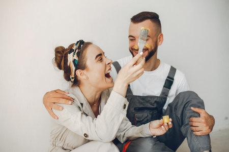 The young and cute family repairs the room