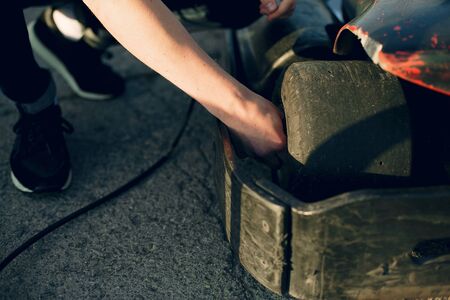 Handsome man in a karting with a carの写真素材