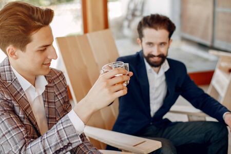 Two businessmen working at the officeの写真素材