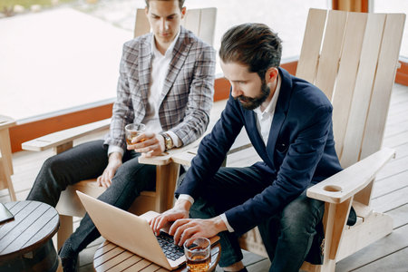 Two businessmen working at the office