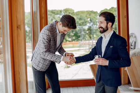 Two businessmen working at the officeの写真素材