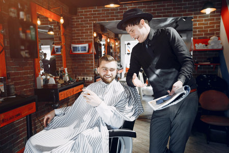 Stylish man sitting in a barbershop