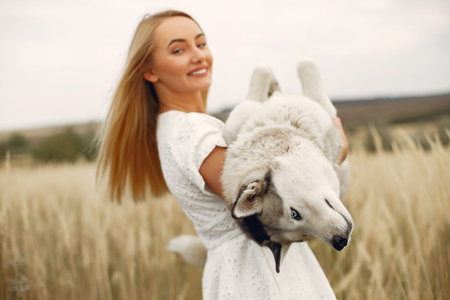 Elegant and stylish girl in a autumn field