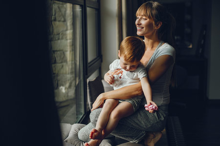 Mother with son at home