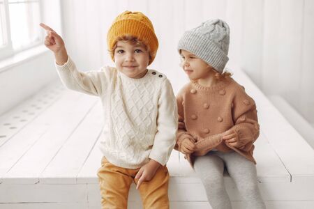 Cute children have fun in a studioの写真素材