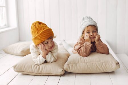 Cute children have fun in a studioの写真素材