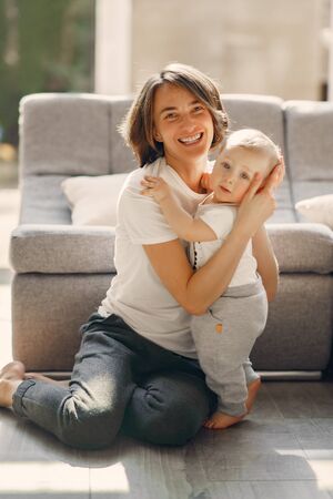 Mother with little son stay at home on quarantineの写真素材