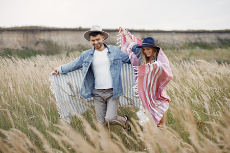 Very beautiful couple in a wheat field