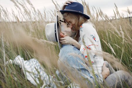 Very beautiful couple in a wheat fieldの写真素材