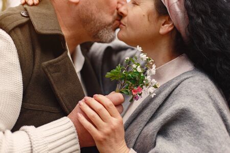 Elegant adult couple in a spring forestの写真素材