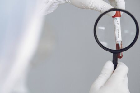 Man in protective suit and glasses in studioの写真素材