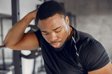 A handsome black man is engaged in a gymの写真素材