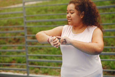 Over the size of a woman doing stretching exercisesの写真素材