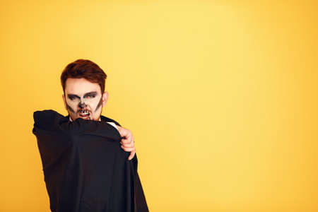 Young man with costume ready to Halloween partyの写真素材