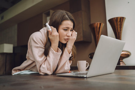 Sick woman with headache stay at home