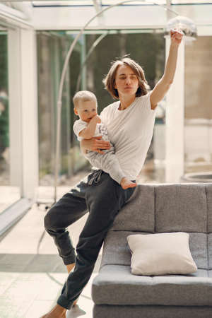 Mother with little son stay at home on quarantineの写真素材