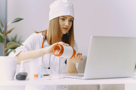 Woman doctor recording vlog video about medicin