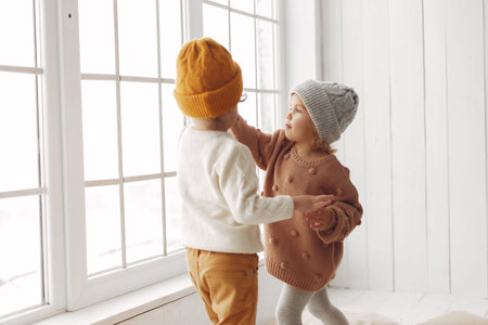 Cute children have fun in a studio