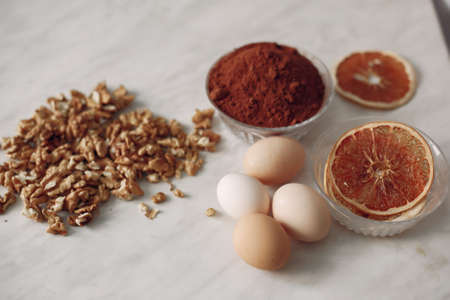 Iingredients for the cake lie on the table.の写真素材