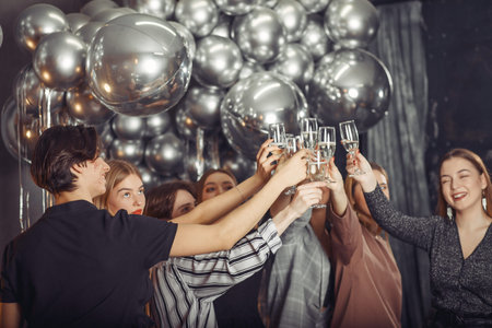 People celebrating a new year with a champagne
