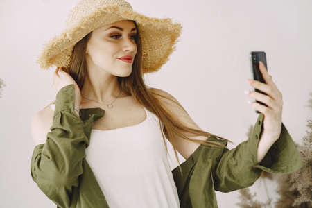 Fashion girl posing in a photo studioの写真素材