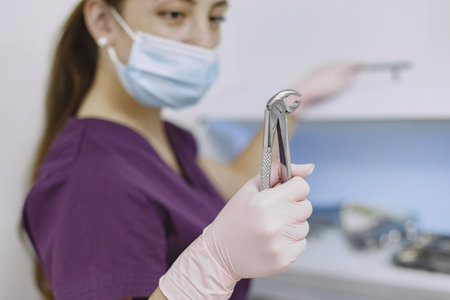 Picture of attractive female dentist with toolsの写真素材