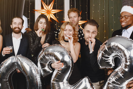 International people having fun in a party room