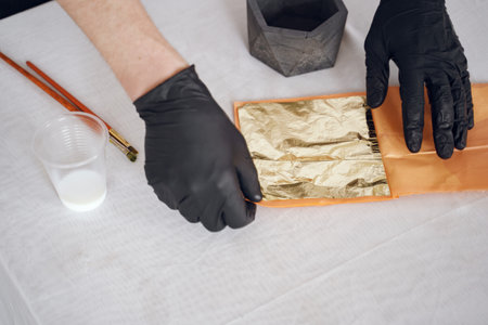 Man in a white shirt works with a cementの写真素材