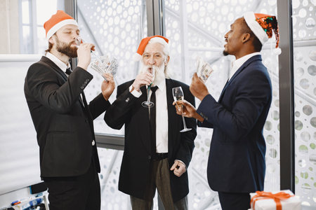 Three busines partners men in the officeの写真素材