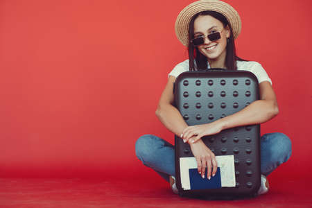 Stylish girl in a studio withの写真素材
