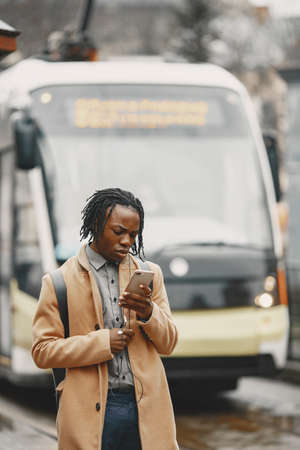 Handsome Afro American man in a autumn cityの写真素材