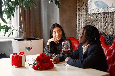 Romantic dinner in a restaurant with wine and delicious food