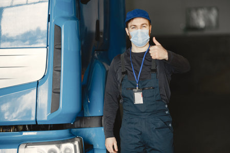 Worker checks product in mask during coronavirus