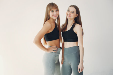A beautiful girls is engaged in a yoga studioの写真素材
