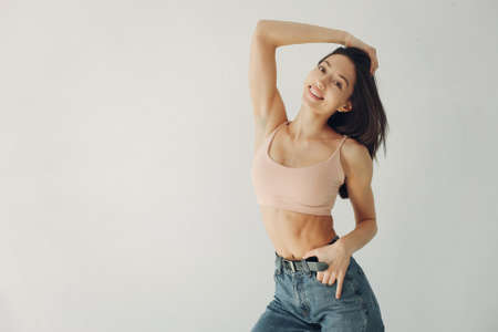 Fashion girl posing in a photo studioの写真素材
