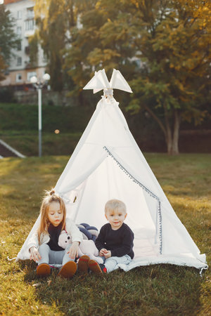 Family in a park playing on a grass