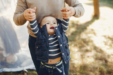 Cute family playing in a summer park