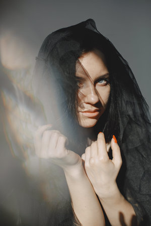 Beautiful young woman dancing in studio