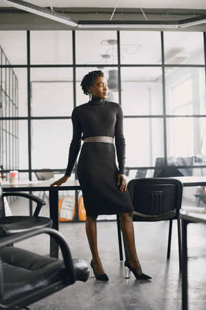Portrait of a confident black businesswoman working at officeの写真素材