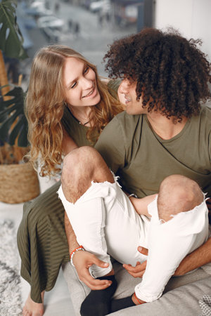 Multiracial couple in love on the floor