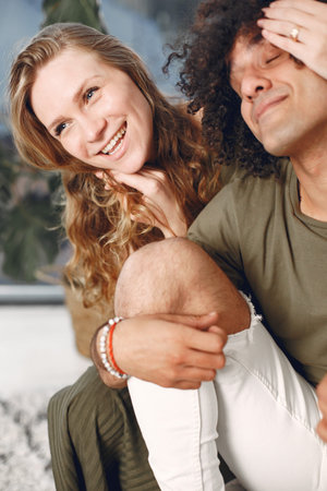 Multiracial couple in love on the floor