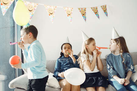 Group of kids celebrate birthday partyの写真素材