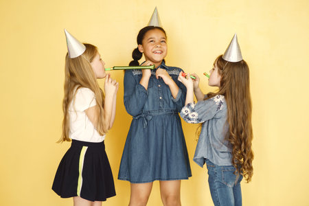 Little African girl celebrate her birthday with friends