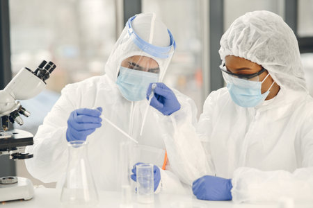 Chemist researchers during global pandemic